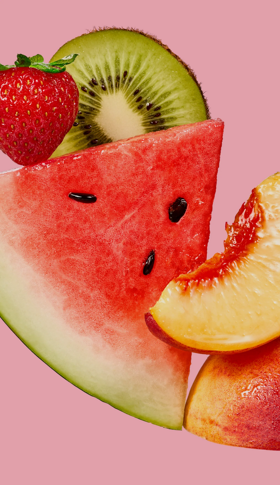 Strawberry cream cake slice with a whole strawberry on a green glass plate against a pale green background